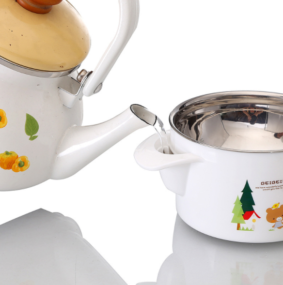 Double Layer Insulated Bowl for Kids next to a kettle, showcasing child-friendly kitchenware.